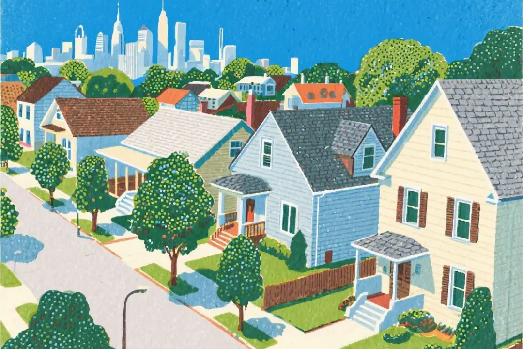 A mix of gabled and flat rooftops across a Northwest Philadelphia neighborhood